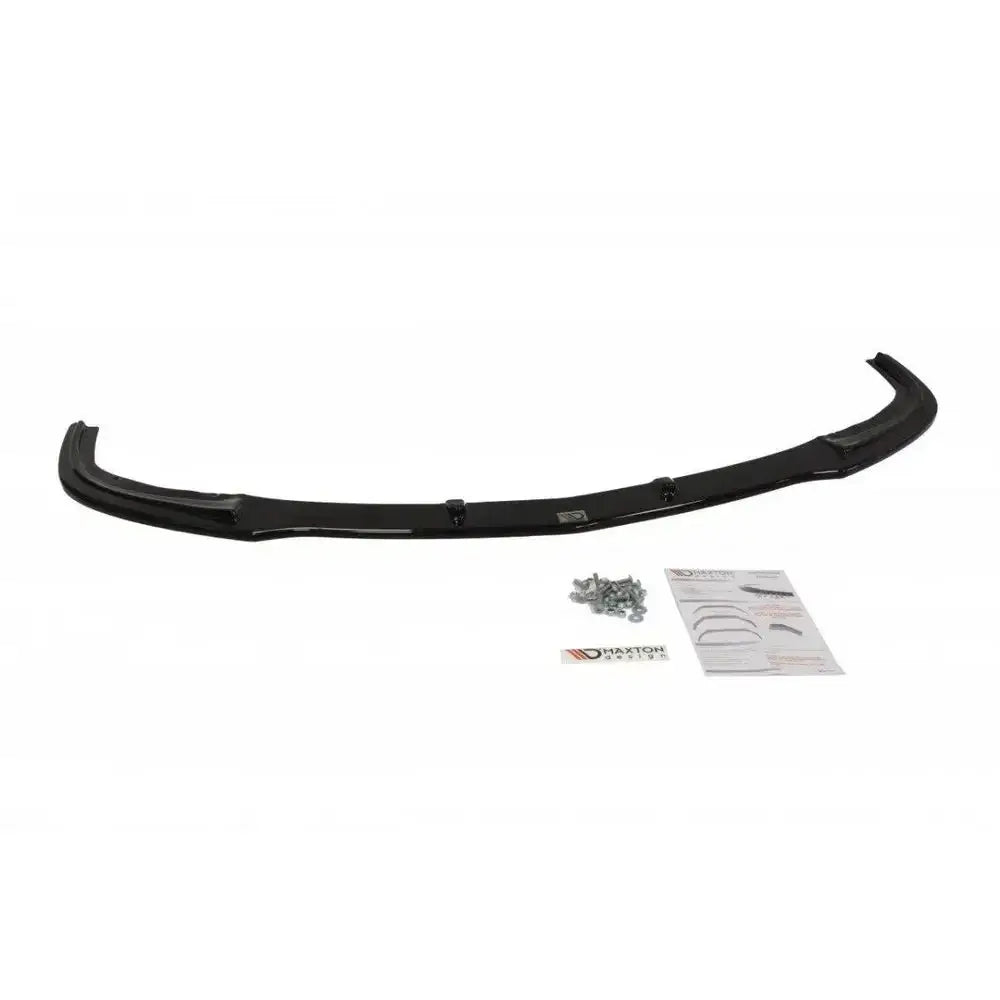 Front lip til Mazda 3 Mk2 Sport, sett ovenfra med skruer og instruksjoner på hvit bakgrunn.