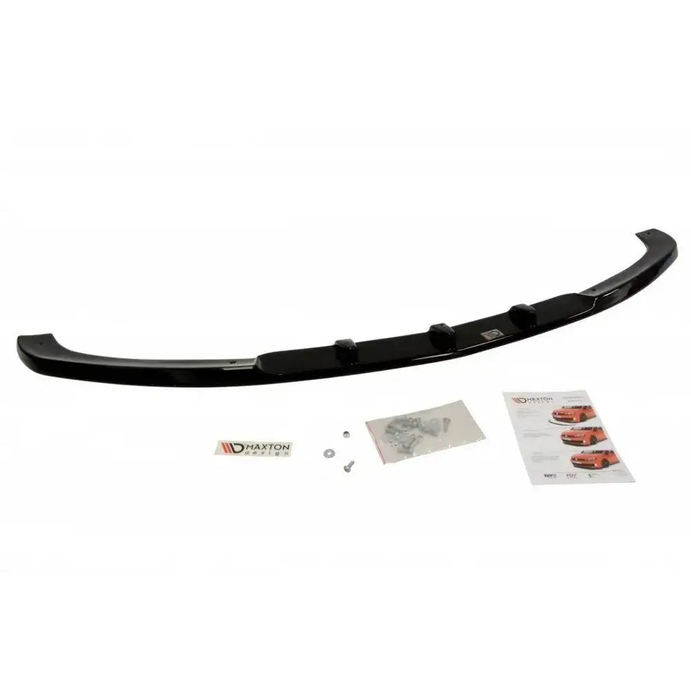 Frontspoiler til Mercedes Glk W204 i sort glanset plast, sett ovenfra med monteringsdeler og instruksjoner.