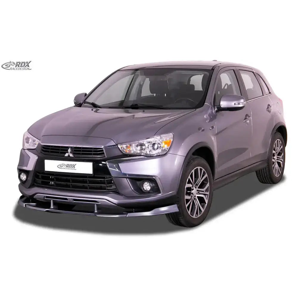 Frontleppe på Mitsubishi ASX 16-19 SUV sett skrått forfra med markante felger mot hvit bakgrunn.