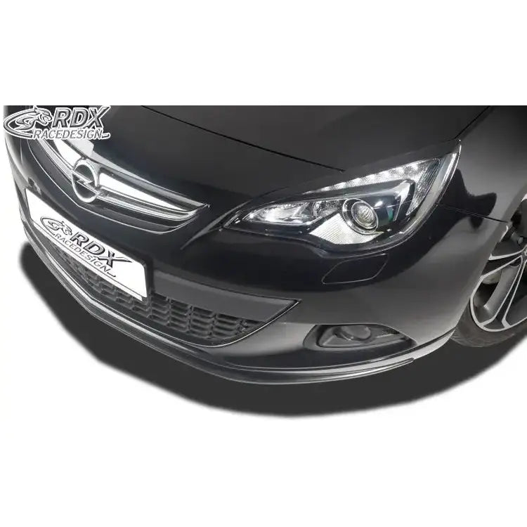 Front splitter Opel Astra J GTC OPC-Line med kromdetaljer og fokus på høyre frontlykt.