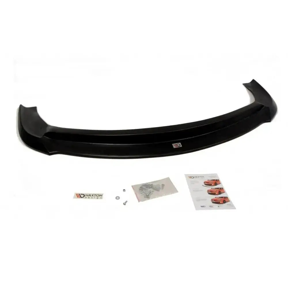 Front splitter til Porsche 911 Carrera 997.2, sort plast med monteringskit, skruer og instruksjonshefte.