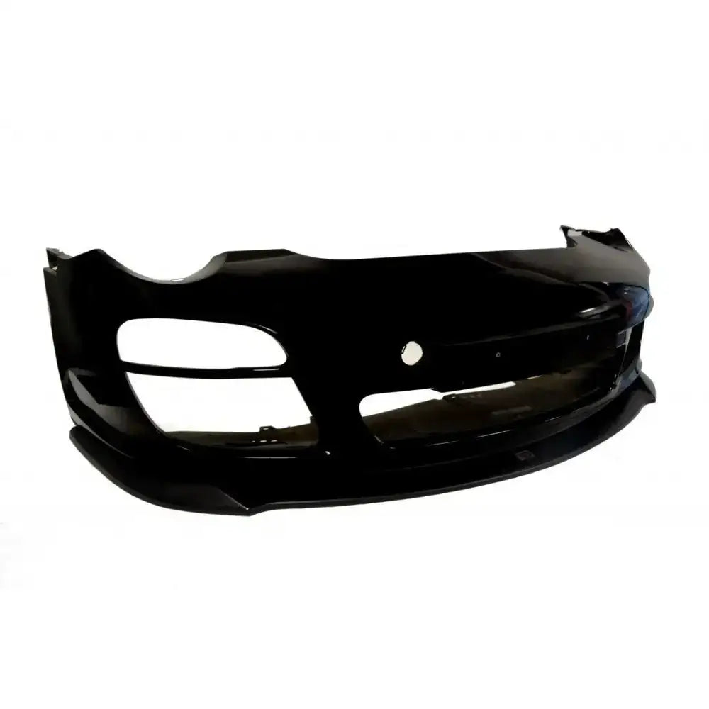 Front lip til Porsche 911 Carrera 997.2 Facelift, sort plast med åpninger for lykter og luftinntak.