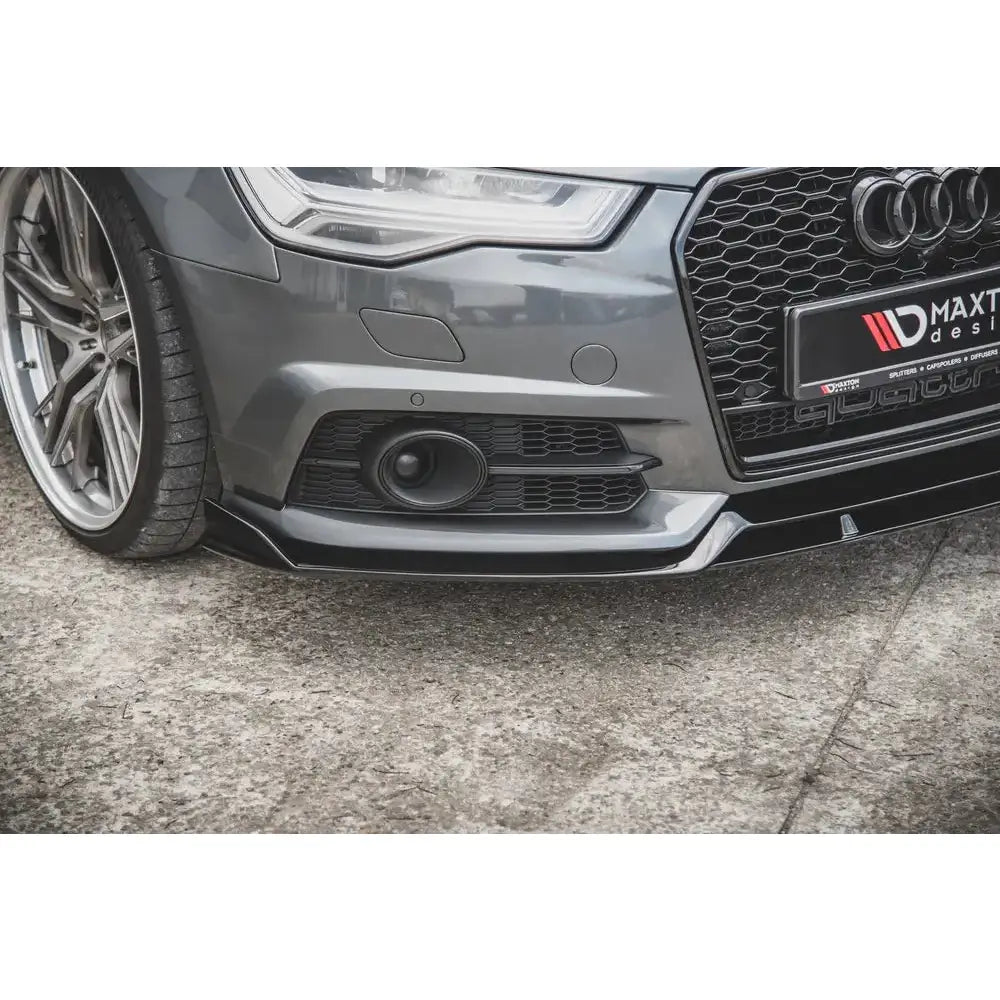 Front lip Audi S6 / A6 S-Line C7 FL i sort plast montert under støtfanger, sett fra siden.