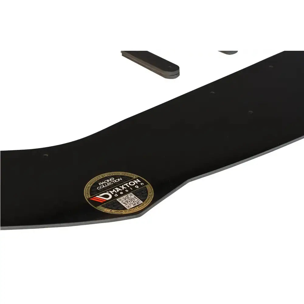 Frontspoiler BMW 1 F20/F21 M-Power Racing V.1 i matt sort, nærbilde med gull etikett og QR-kode.