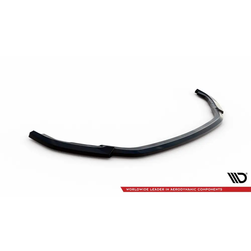 Frontspoiler til Renault Express Mk2 i sort plast med glanset overflate, sett ovenfra på hvit bakgrunn.
