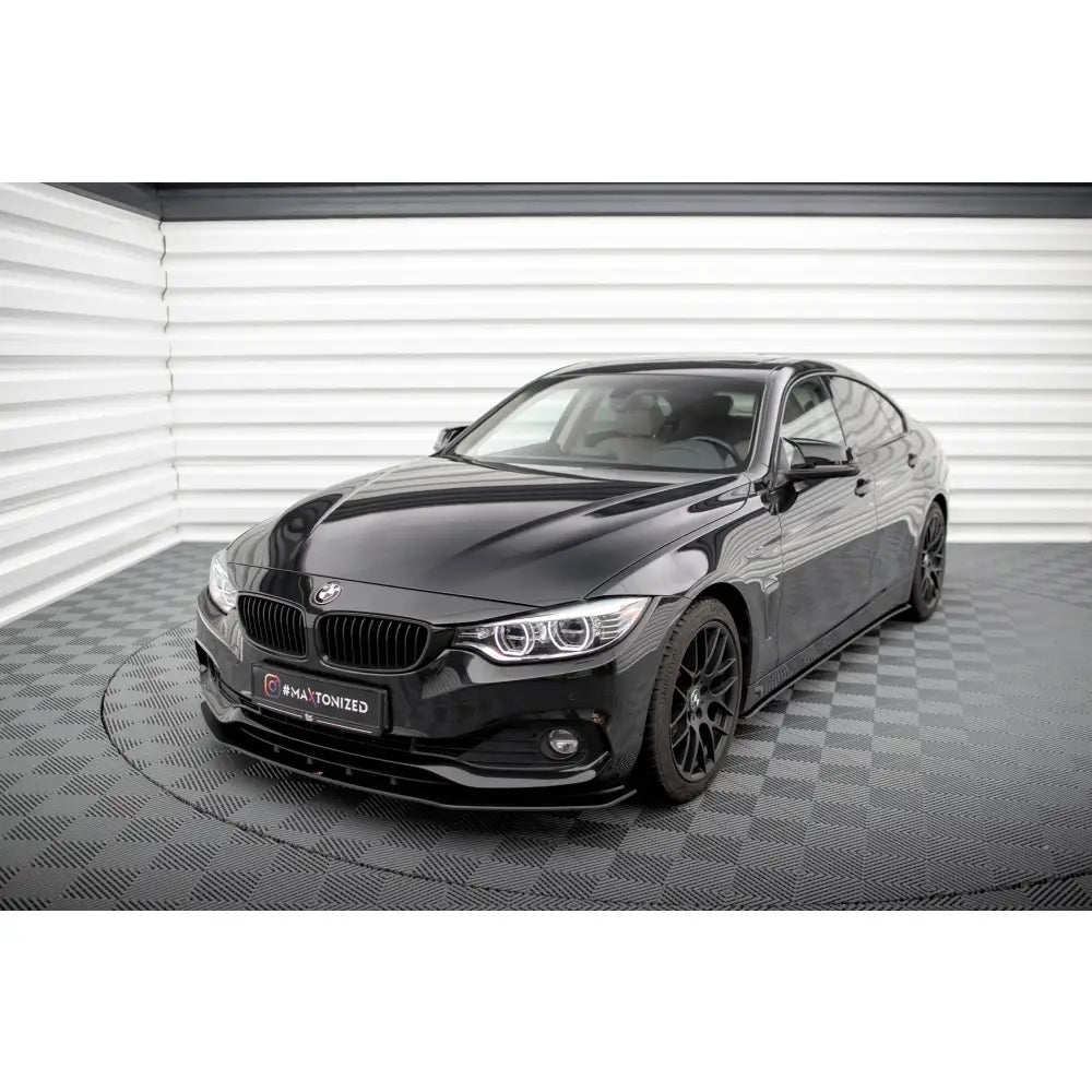 Frontleppe på BMW 4 Gran Coupe F36 Street Pro sett skrått forfra med mørke felger og LED-frontlykter.