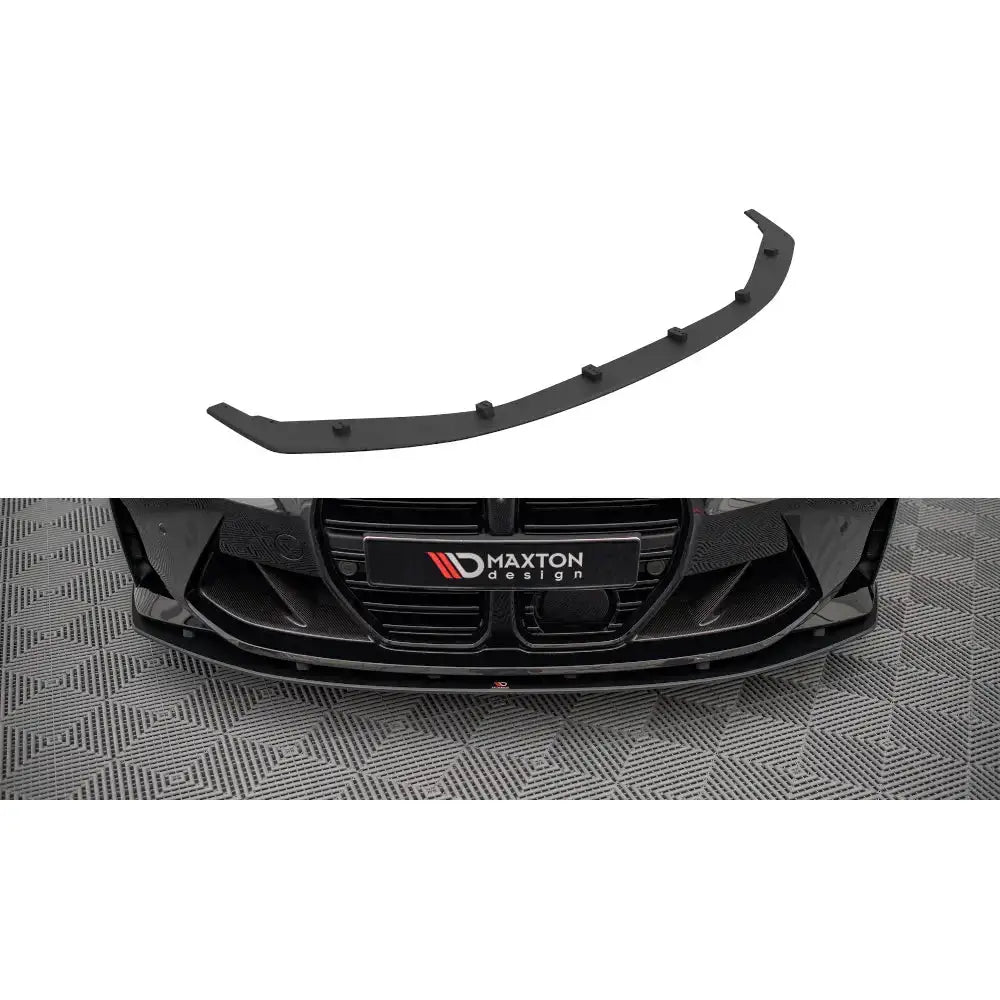 Frontspoiler Street Pro til BMW M4 G82 sett ovenfra, montert på bilens frontfanger i sort plast.