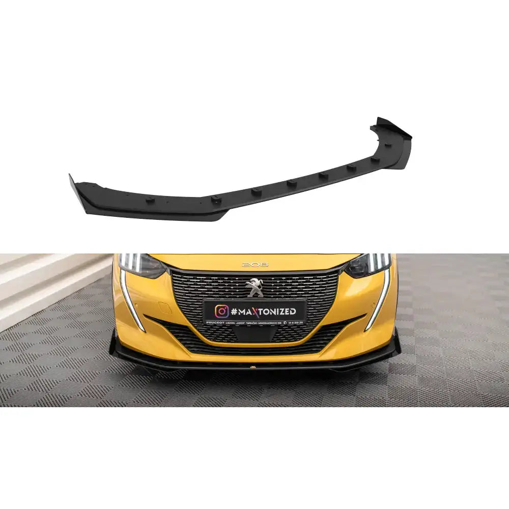 Frontspoiler Peugeot 208 GT Mk2 Street Pro med flaps, sort plast, montert på gul bil sett forfra.