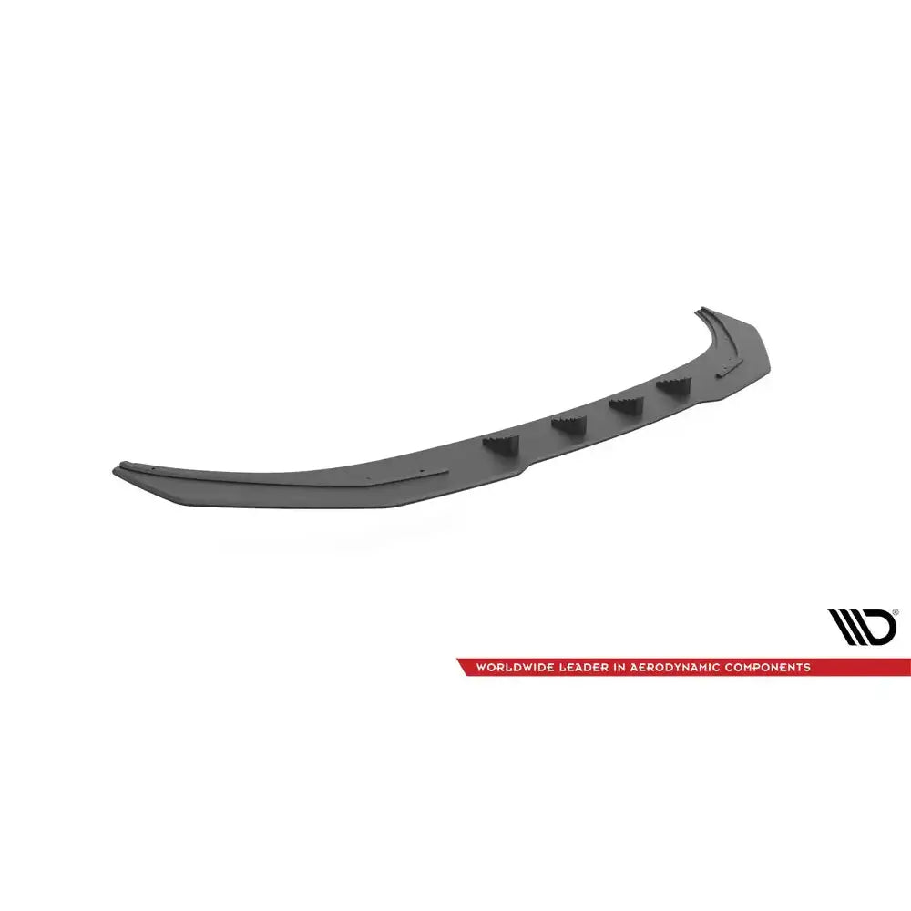 Front lip til Nissan 370Z Nismo Facelift, svart plastspoiler med opphøyninger, sett skrått ovenfra.