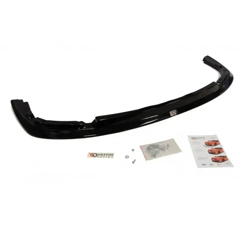 Front splitter til Subaru Impreza WRX STI, sort glanset spoiler med utstyr og instruksjoner sett ovenfra.