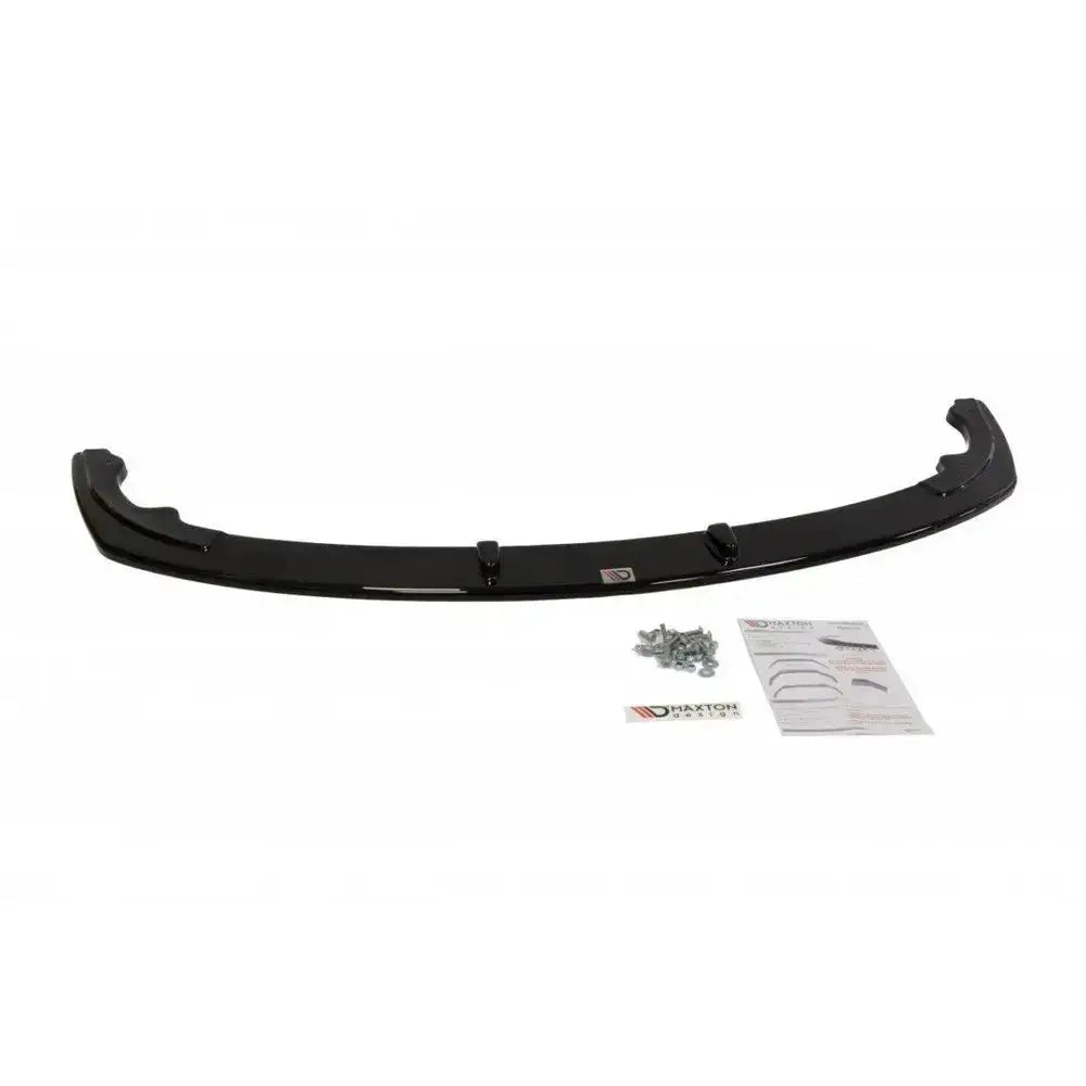 Front lip til Toyota Celica T23 Ts Preface i sort glanset plast med skruer og instruksjonsark.