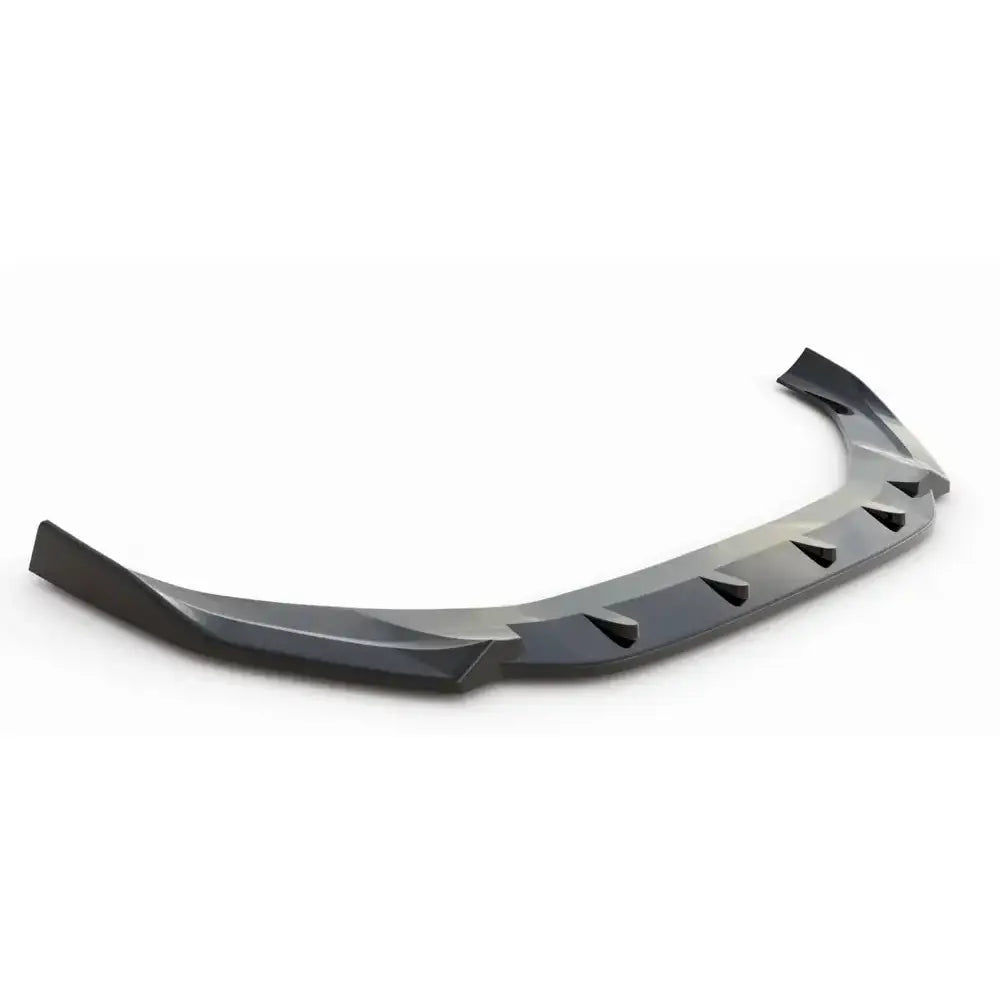 Front lip Audi A4 B9 Facelift V.1 svart spoiler med vinkler og opphøyde detaljer, sett skrått forfra.