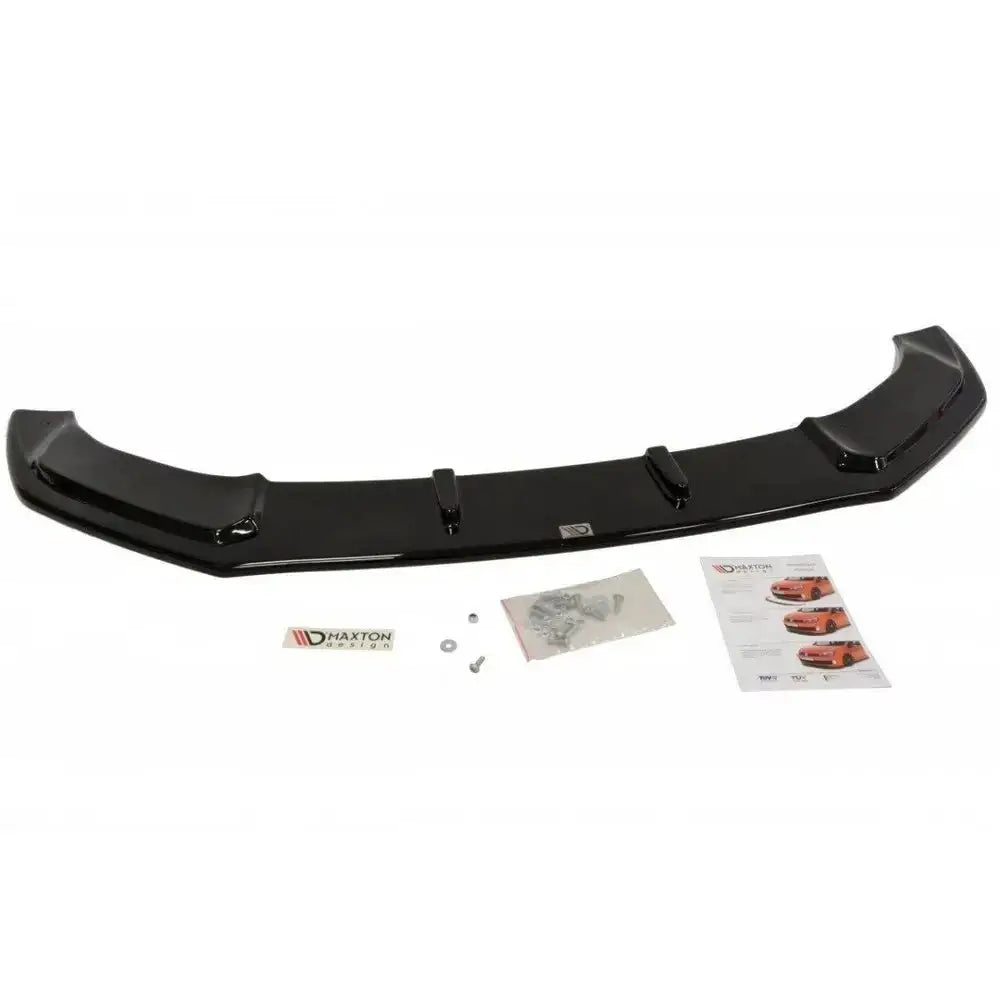 Front lip Audi TT Mk2 V.1 Rs spoiler i sort plast med skruer, instruksjonshefte og klistrelapp.