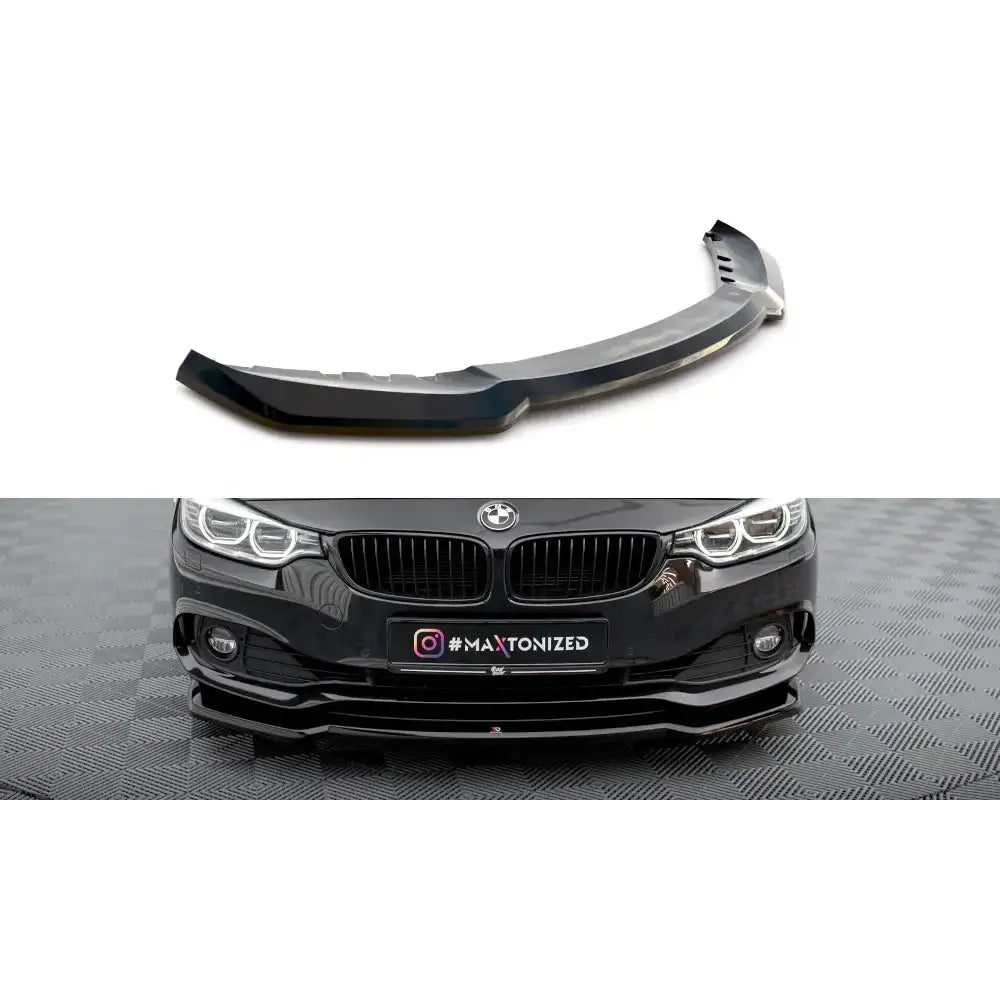 Frontspoiler BMW 4 Gran Coupe F36 V.1 i sort plast med glanset finish, montert på bilens front.