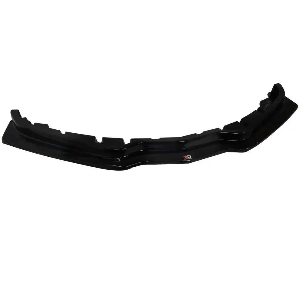 Frontspoiler Chevrolet Corvette C7 V.1 i sort blank plast sett rett forfra med diskret logo i midten.