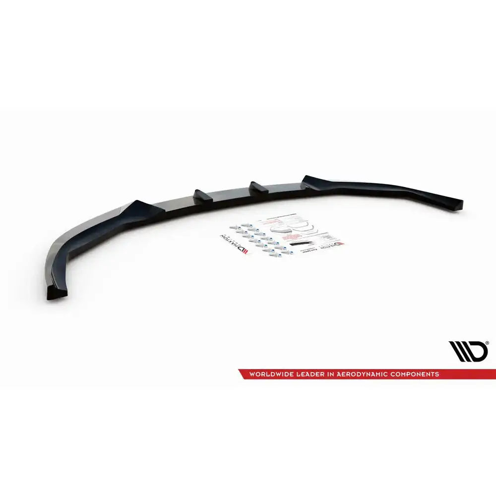 Frontspoiler til Dodge Charger RT Mk7 Facelift, svart med monteringsutstyr og instruksjoner synlig.