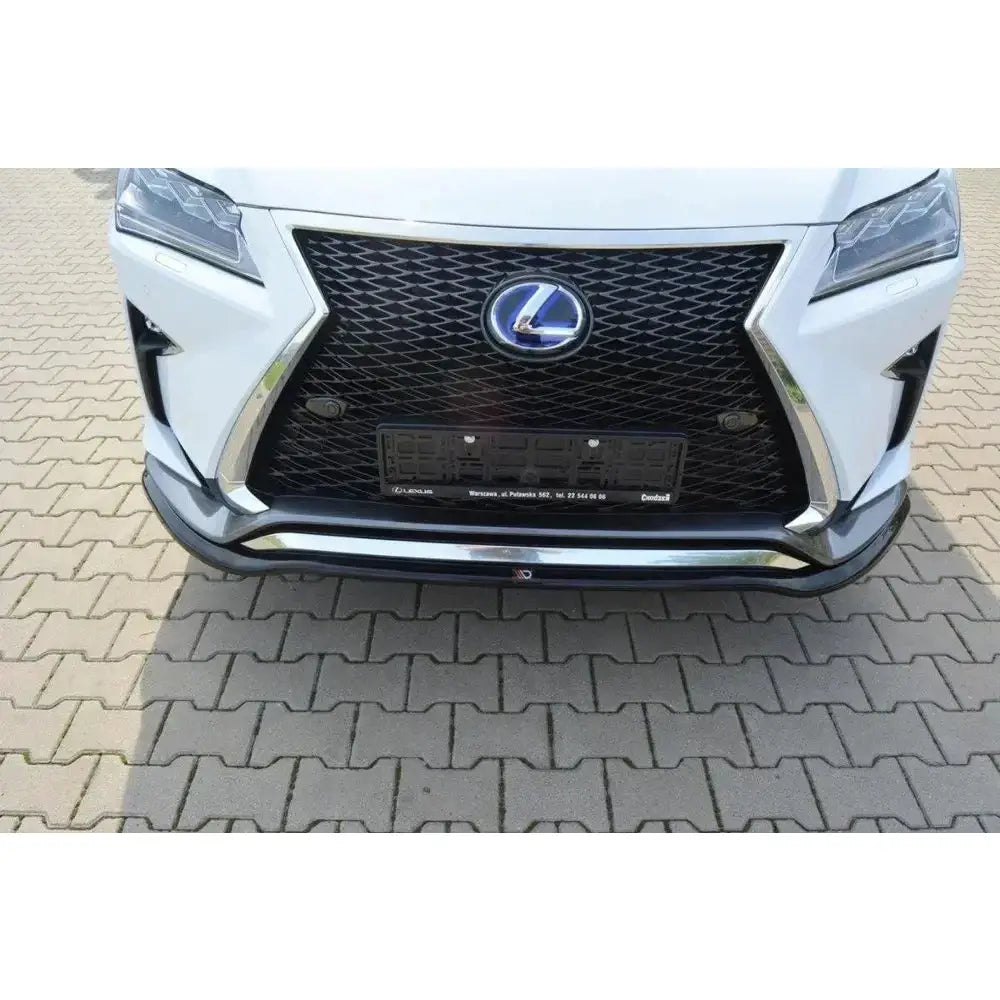 Frontleppe til Lexus RX Mk4 V.1 F-Sport, hvit bil med stor sort grill og synlig Lexus-logo forfra.