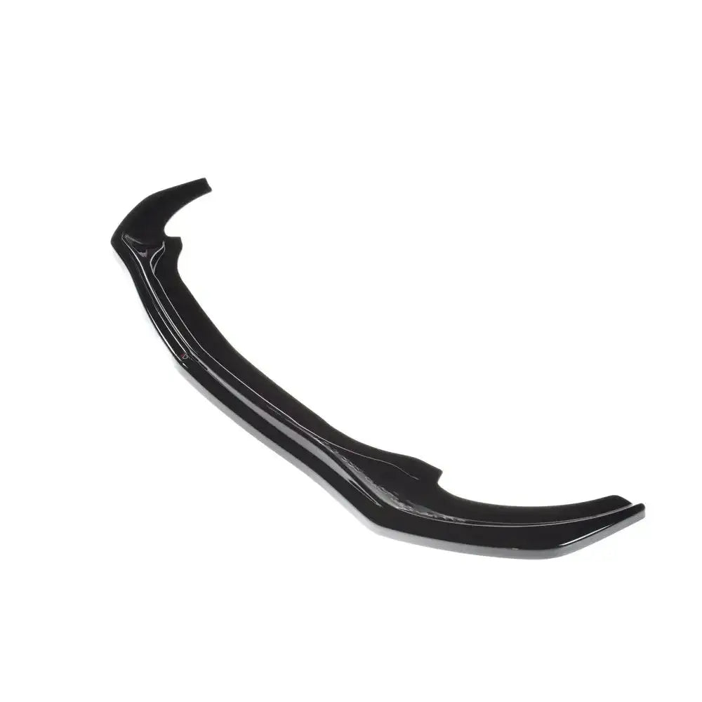 Front lip til Mercedes S-Klasse Amg-Line W222 V.1 i svart glanset plast, skrått ovenfra mot hvit bakgrunn.