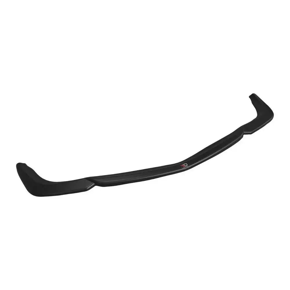 Front lip til Mercedes CLS C219 V.1 55AMG, svart plastspoiler med logo, sett skrått ovenfra mot hvit bakgrunn.