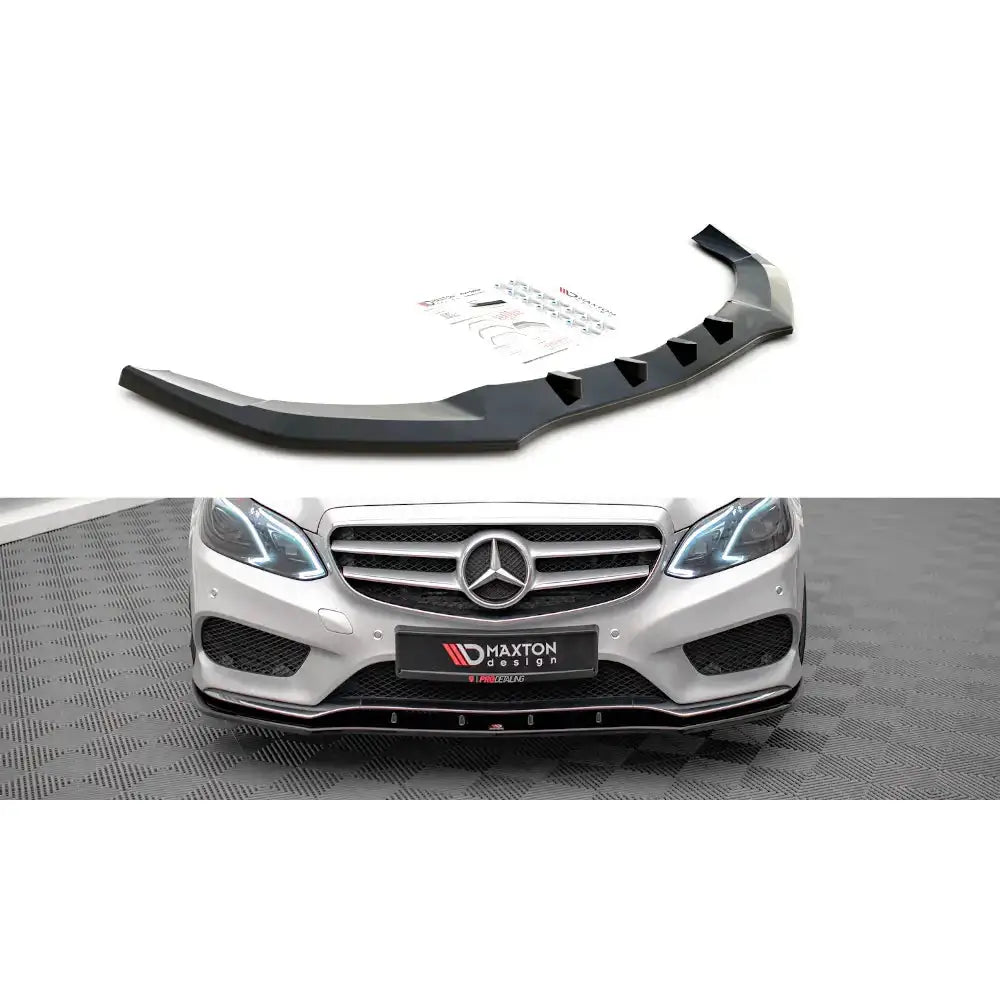 Frontleppe til Mercedes E AMG-Line W212, sort plast, sett ovenfra med monteringsutstyr og montert på bil.