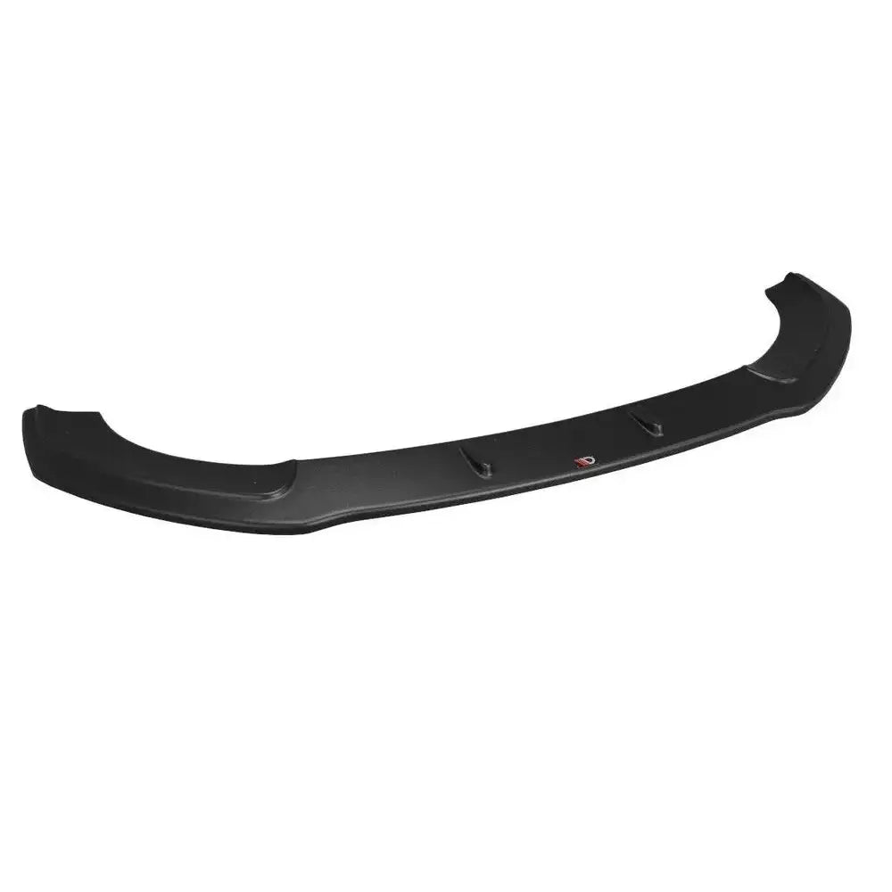 Front lip Audi A7 V.2 Mk1 S-Line sort plastspoiler sett skrått ovenfra med aerodynamiske detaljer.