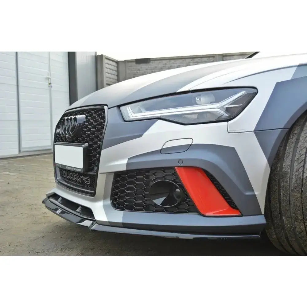 Front splitter Audi RS6 C7 V.2 nærbilde med kamuflasjedekor, sort grill og markerte luftinntak.