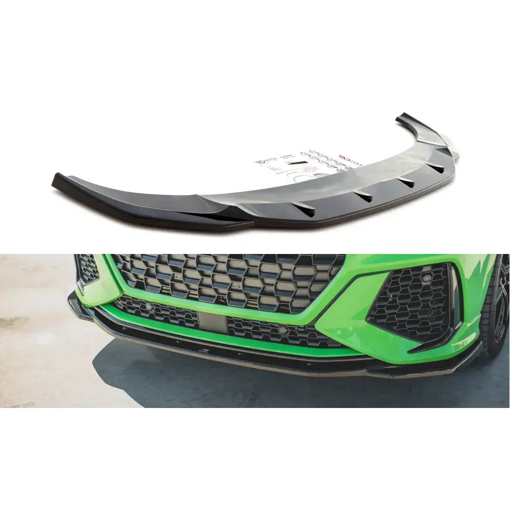 Frontspoiler Audi RSQ3 F3 V.2 montert på grønn bil, sort splitter med aerodynamiske ribber foran grillen.