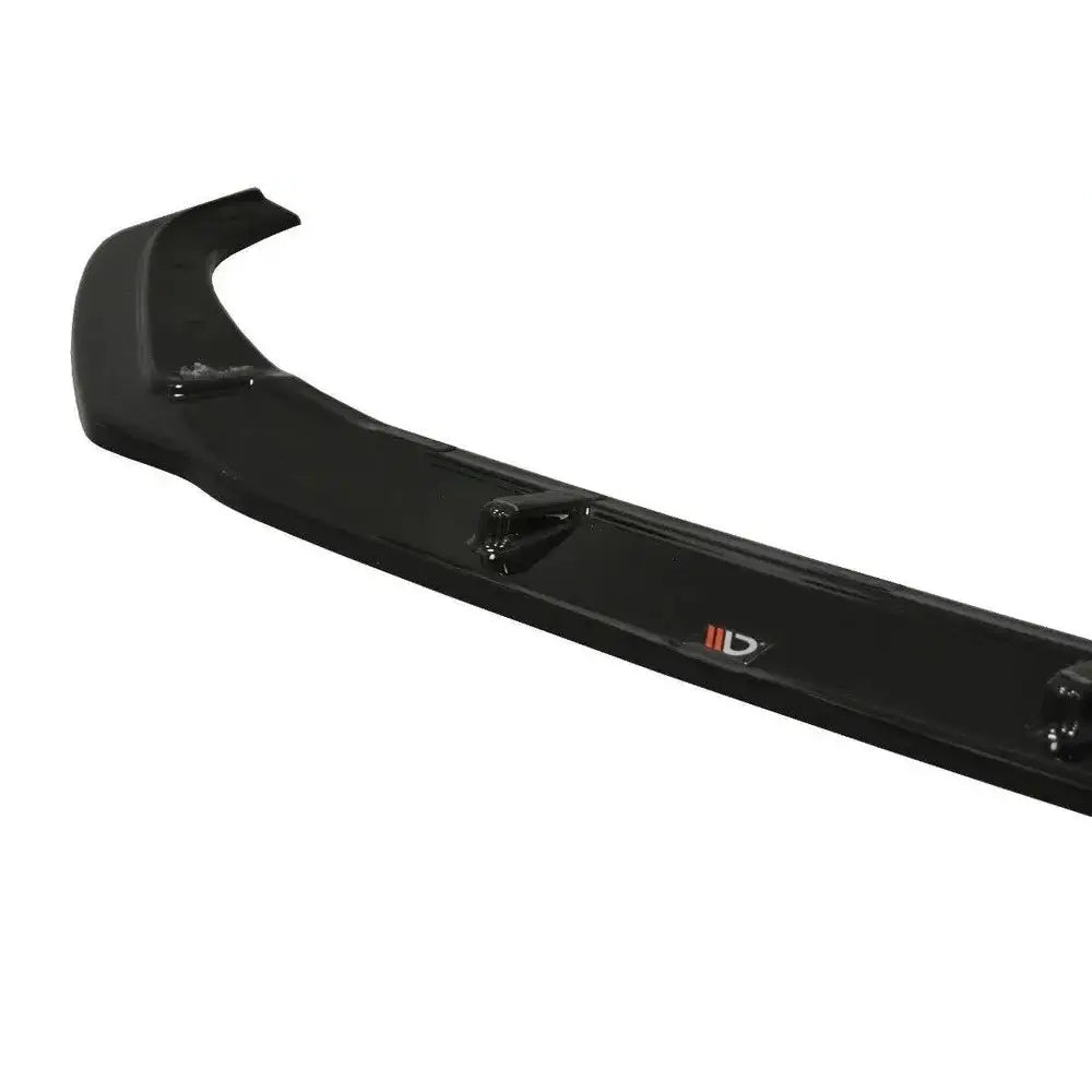 Frontspoiler Audi S4 / A4 S-Line B9 V.2 i sort blank plast, sett skrått ovenfra med logo og festeanordninger.