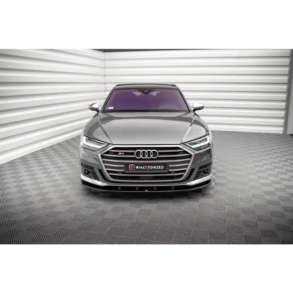 Frontspoiler på Audi S8 D5 V.2, sett forfra med sølvfarget spoiler og markant grill.