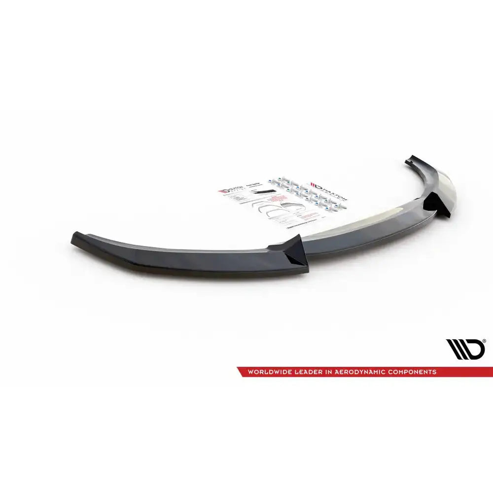 Front splitter til BMW 1 F20 V.2 11-15, svart plast med monteringsutstyr og instruksjonsark.