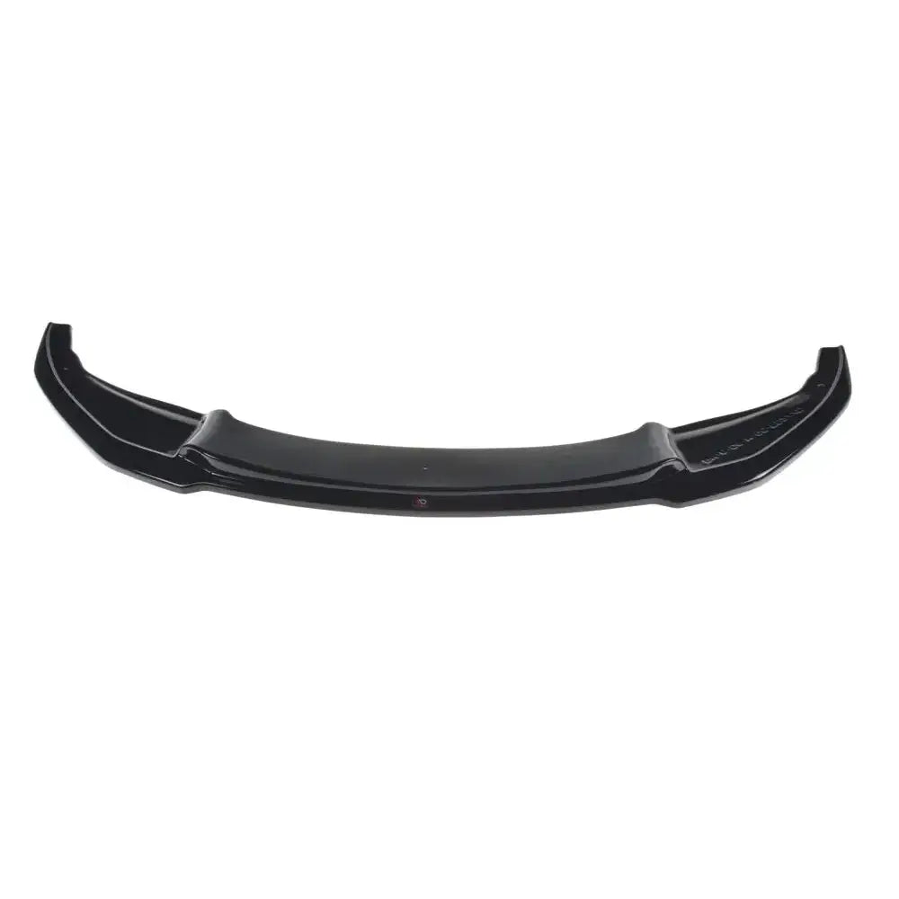 Frontspoiler BMW M6 F06 Gran Coupe V.2 i sort, glanset finish sett forfra mot hvit bakgrunn.