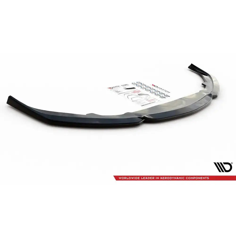 Spoiler til Lexus IS F Mk2 V.2 i svart plast med monteringsutstyr og instruksjoner på hvit bakgrunn.