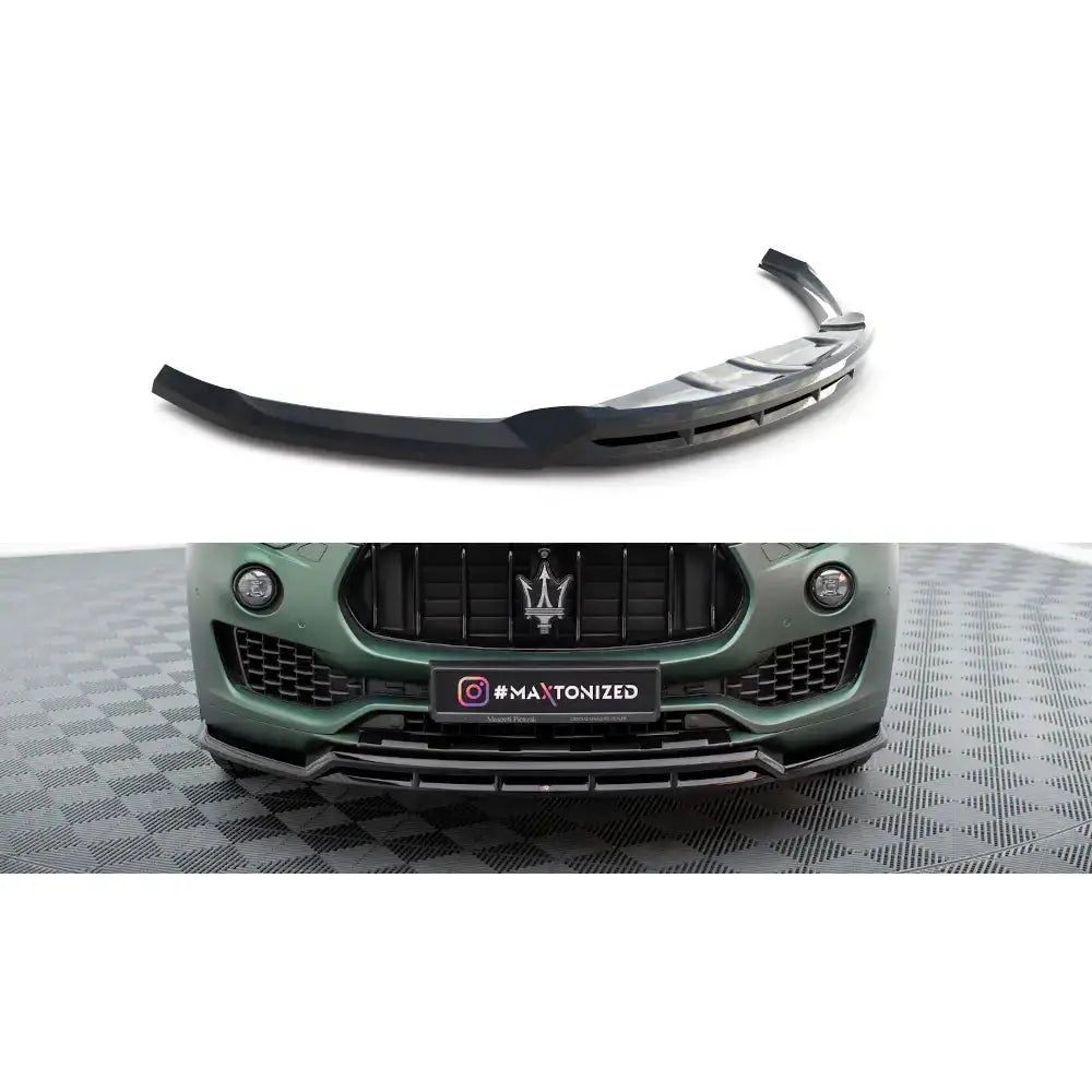 Frontspoiler til Maserati Levante Mk1 V.2 i svart plast, montert på grønn bilfront med markert kant.