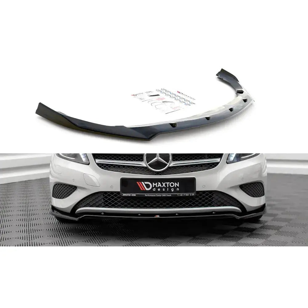 Frontspoiler til Mercedes A-Klasse W176 V.2 12-15 i sort plast, montert på hvit bil med sportspreg.