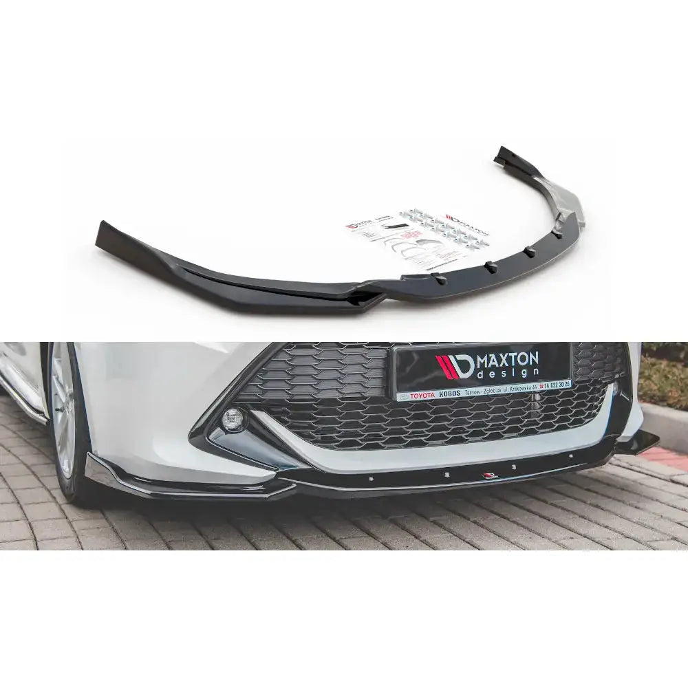 Frontleppe V.2 Toyota Corolla XII sett ovenfra montert på bil med monteringsutstyr og instruksjoner ved siden av.