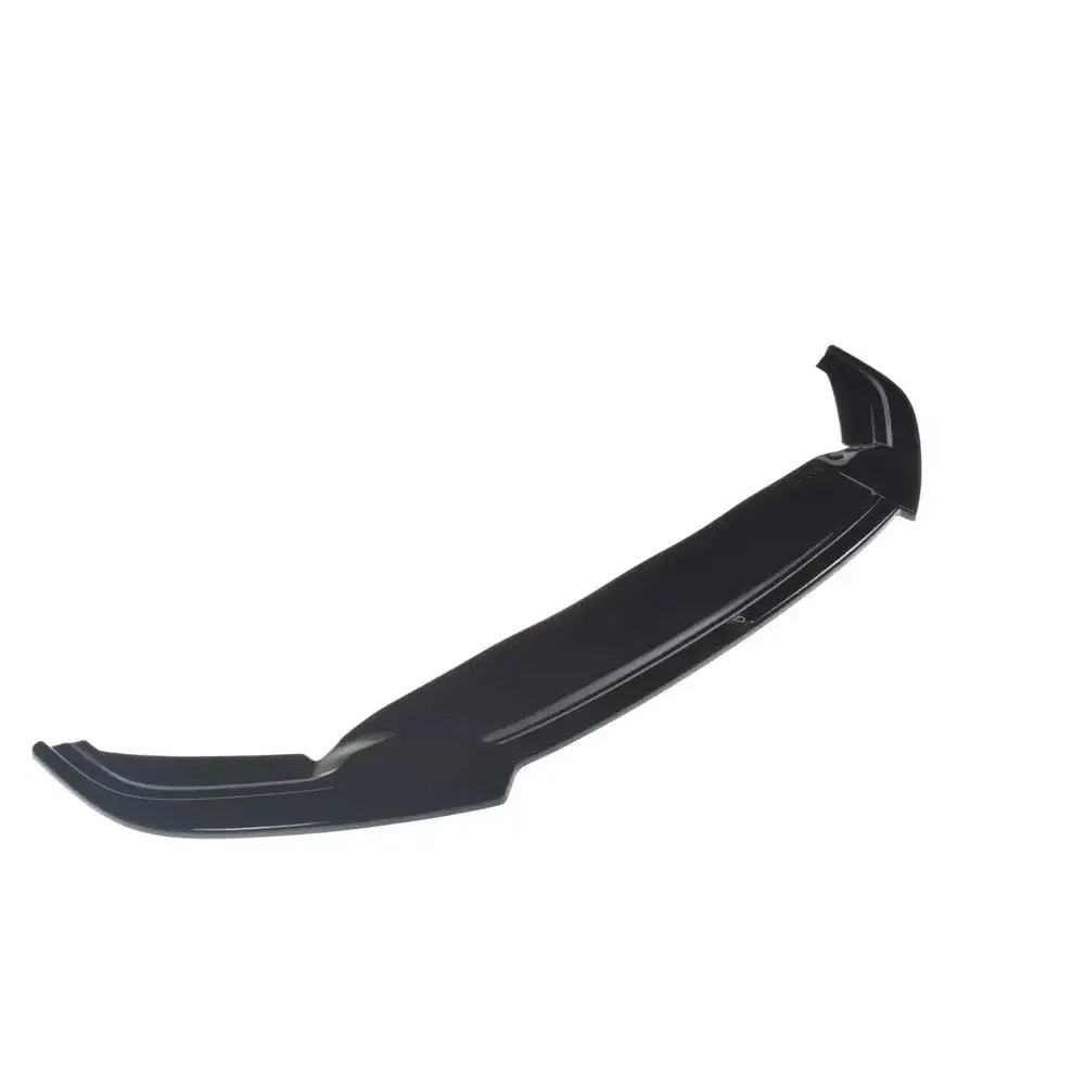 Frontspoiler V.2 Volkswagen Passat R-Line B8 i sort, blank plast sett fra skrått toppvinkel mot hvit bakgrunn.