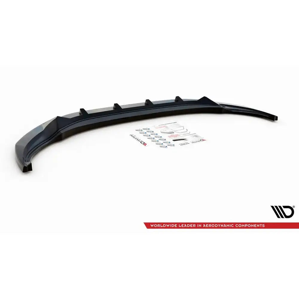 Front lip til Volkswagen Tiguan R facelift, svart plast med ribber og monteringsdeler på hvit bakgrunn.