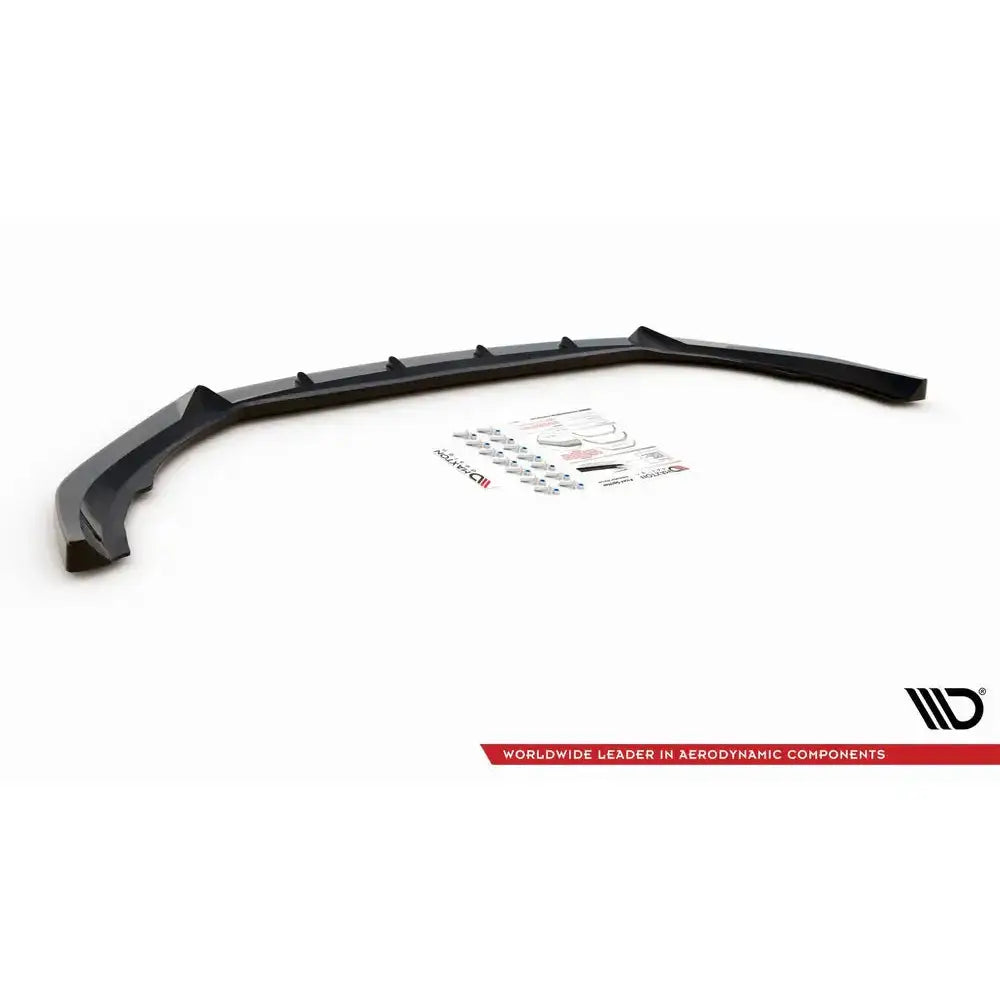Front lip for Volvo V90 Mk2 V.2 16-, svart plast med monteringsdeler og klistremerker, sett ovenfra.