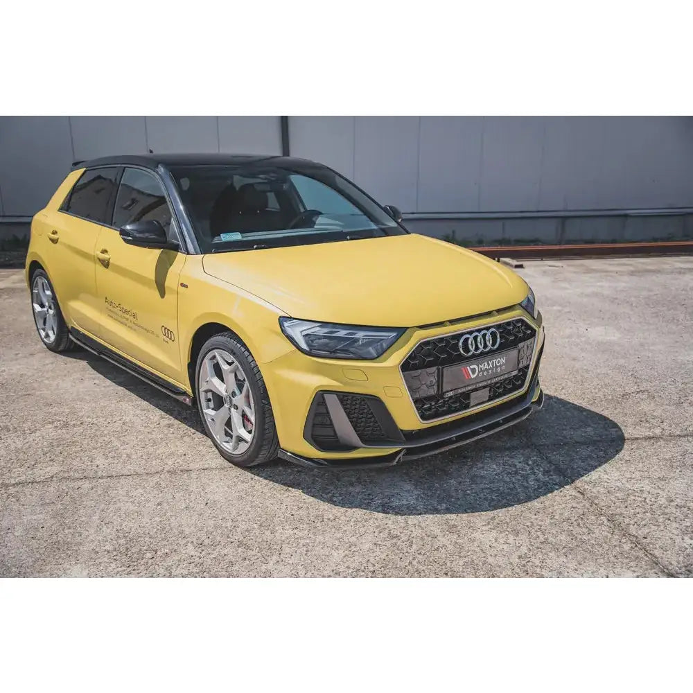 Frontleppe Audi A1 S-Line GB V.3 på gul bil med svart tak, store felger og markant frontgrill utendørs.