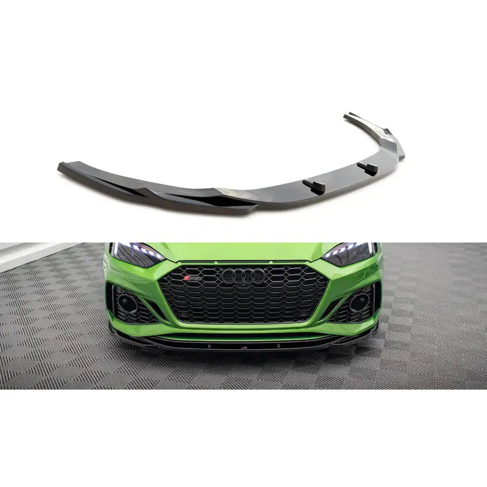 Frontspoiler Audi RS5 F5 Facelift V.3 i blank svart plast, vist fra skrå vinkel og montert på grønn bil.