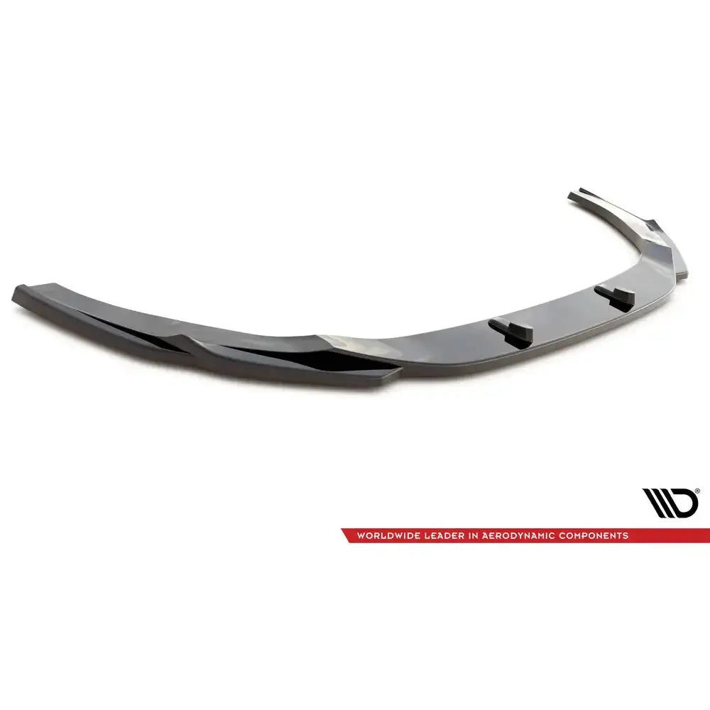 Front lip Audi RS5 F5 Facelift V.3 svart plastspoiler med festeanordninger, sett skrått ovenfra.