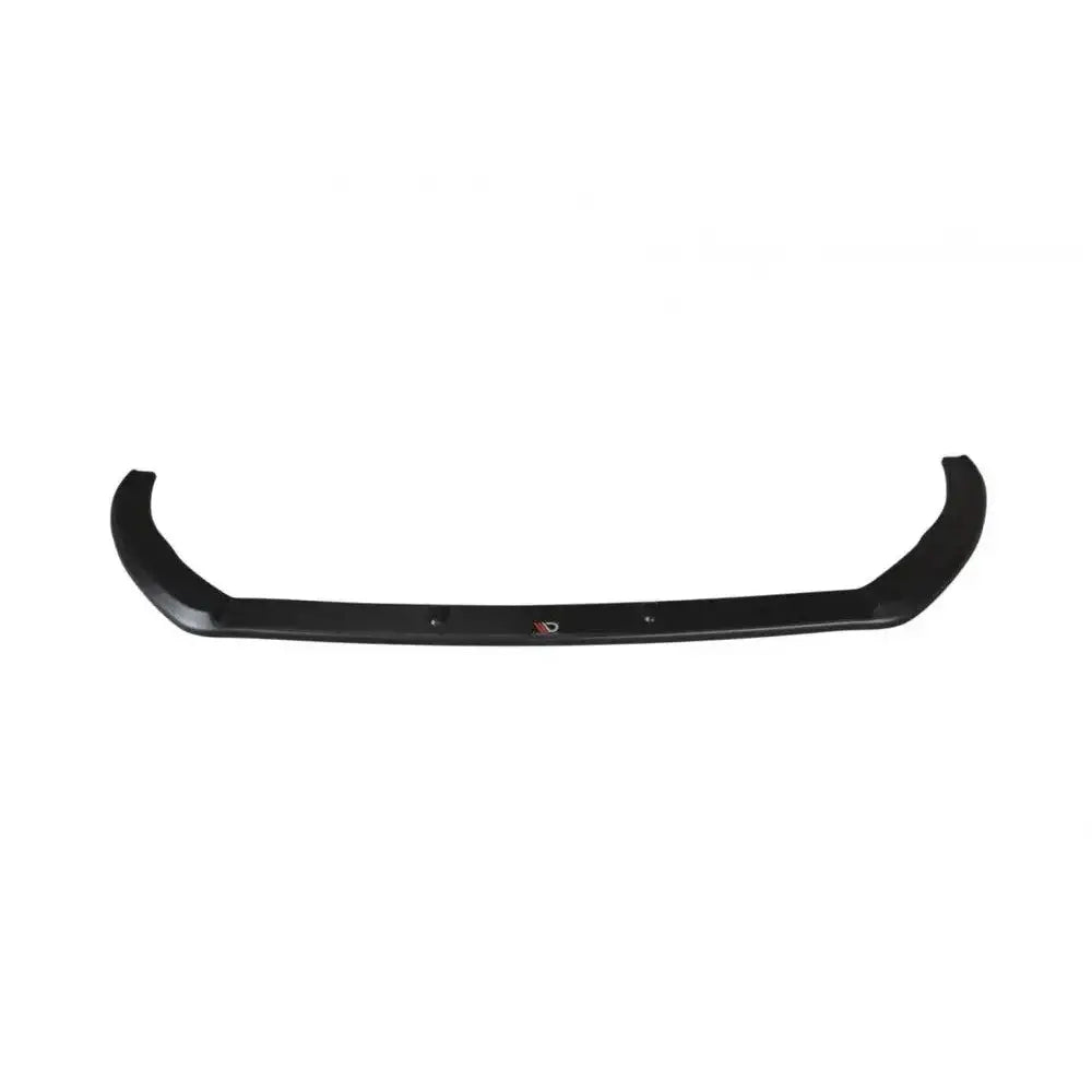 Front lip til Ford Fiesta Mk8 ST st-Line V.3, sort plastspoiler sett forfra med monteringshull og logo.