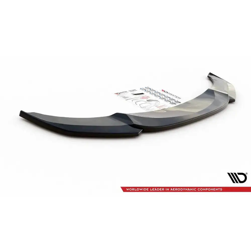 Frontleppe til BMW 5 F10/F11 M-Pack V.4, svart plast med monteringsanvisning og skruer på hvit bakgrunn.