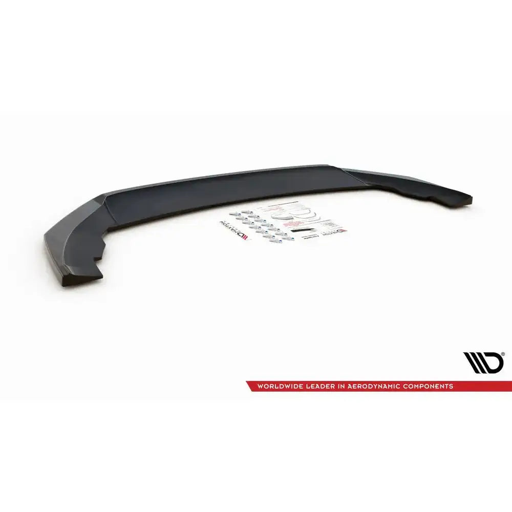 Front lip til Seat Leon FR Mk4 V.4, sort plast med monteringsutstyr og instruksjoner på hvitt underlag.