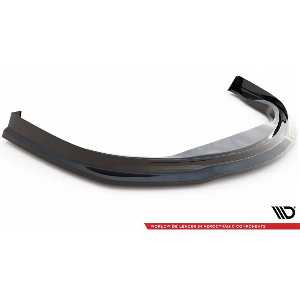 Frontspoiler Porsche 911 Carrera GTS 997 Facelift V1 i sort, glanset plast sett skrått ovenfra mot hvit bakgrunn.