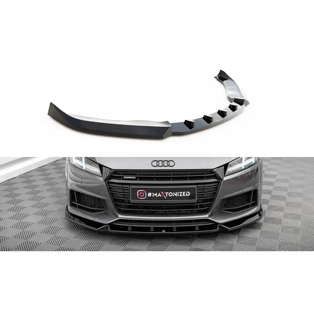Frontspoiler Audi TT 8S V2 S-Line i sort plast, vist montert på grå bilfront fra skrå toppvinkel.
