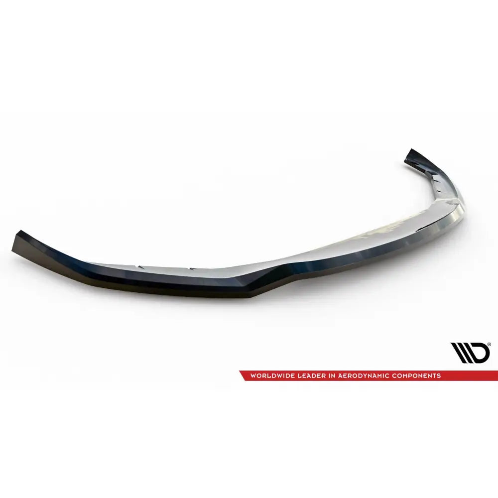 Frontspoiler BMW 5 G30/G31 Facelift V2 i sort, blank plast med aerodynamisk design, sett skrått ovenfra.