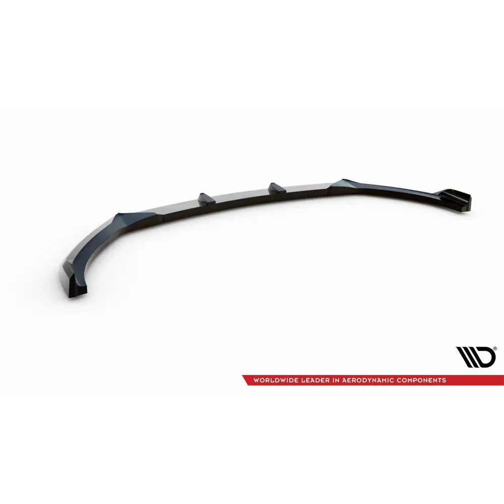 Front lip til Hyundai I20 Mk2 Facelift V2, sort plast med hevede seksjoner, sett skrått ovenfra.