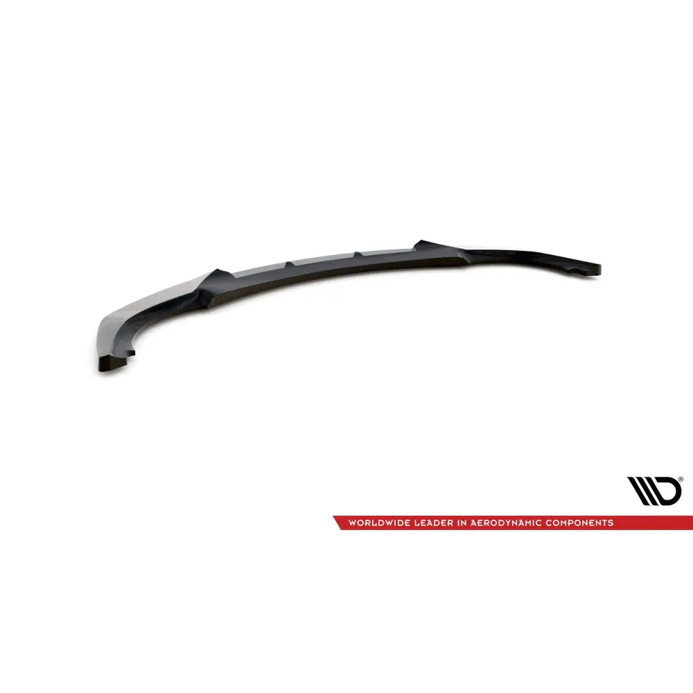 Front lip BMW E46 3 Coupe V3 i svart plast med buet form og markerte kanter, sett fra skrått toppperspektiv.