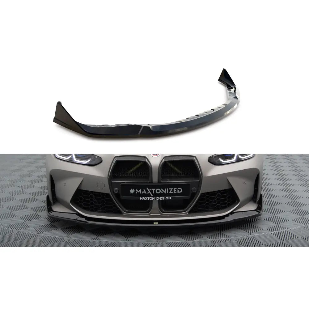 Frontspoiler BMW M4 G82 V4 CSL Look i sort glanset plast montert på bilens frontfanger.